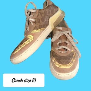 Coach pale pink and brown logo sneakers/ trainers. Low top sneakers.